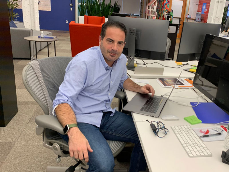 Marc behind desk at Facebook